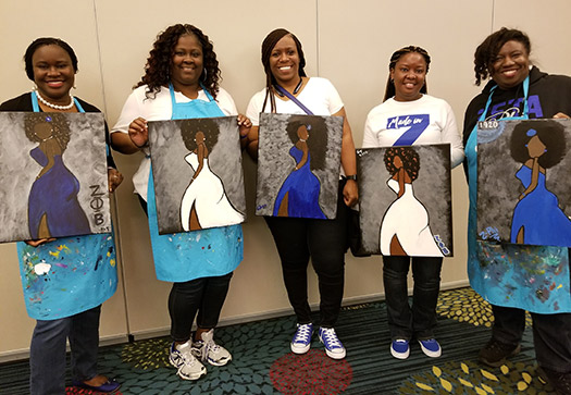Chapter members enjoying a paint event.